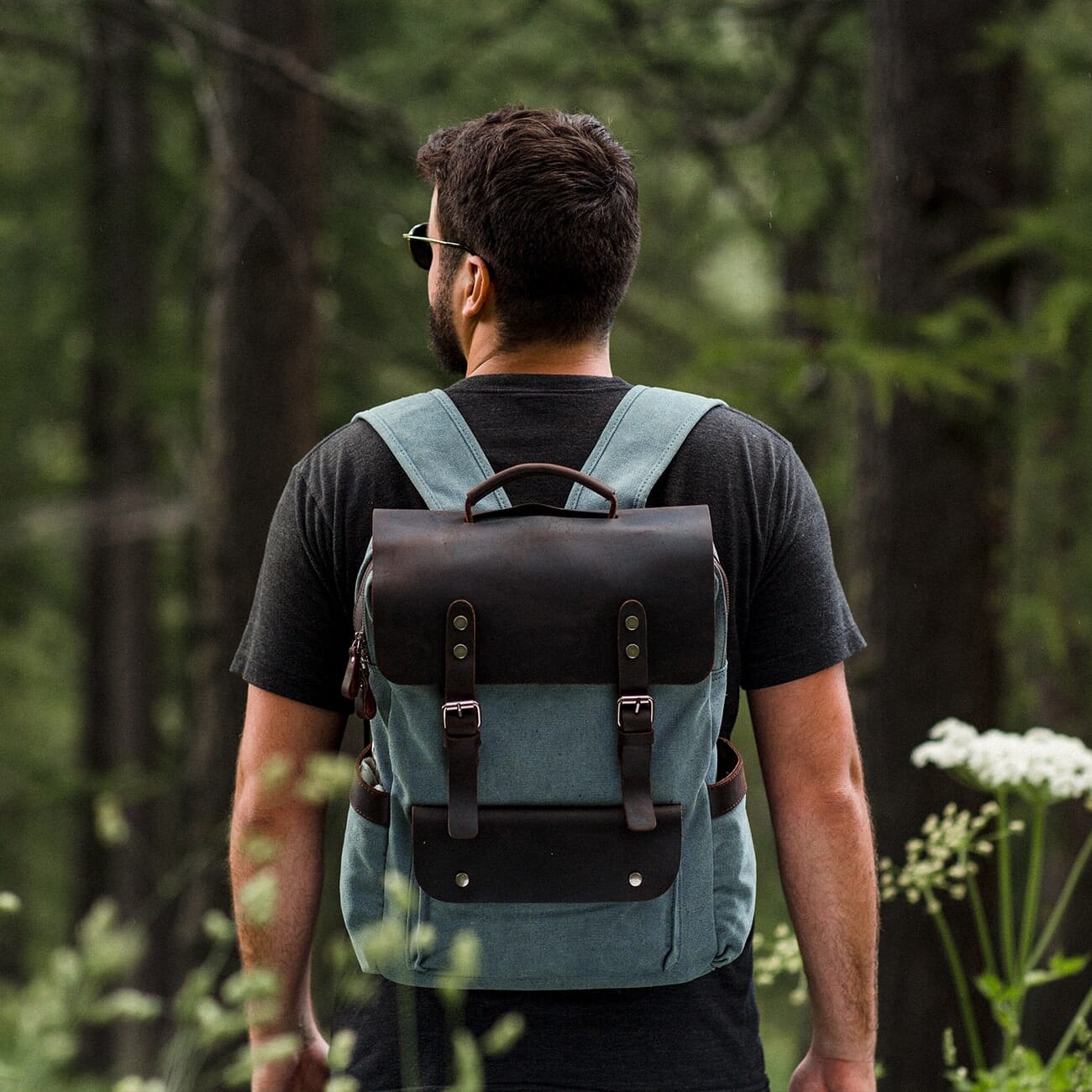 Man wearing Helsinki canvas backpack